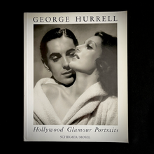 Load image into Gallery viewer, Book cover of 'Hollywood Glamour Portraits' by George Hurrell with a black and white photo of Tyrone Power and Loretta Young, 1937